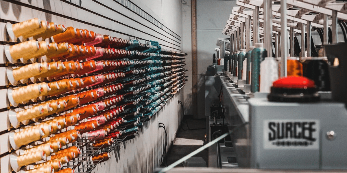 Wall of embroidery threads in Surcee warehouse
